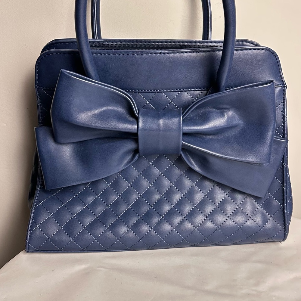 Elegant Blue Quilted Handbag with Bow